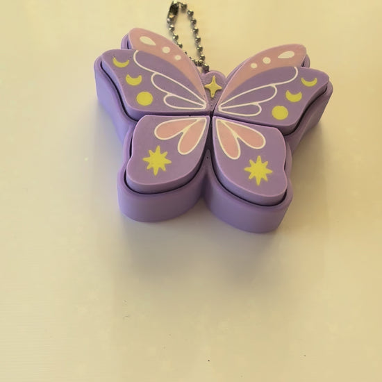 Pixie moth fidget clicker keychain 3D printed lavender with moon and botanical wing details pastel goth